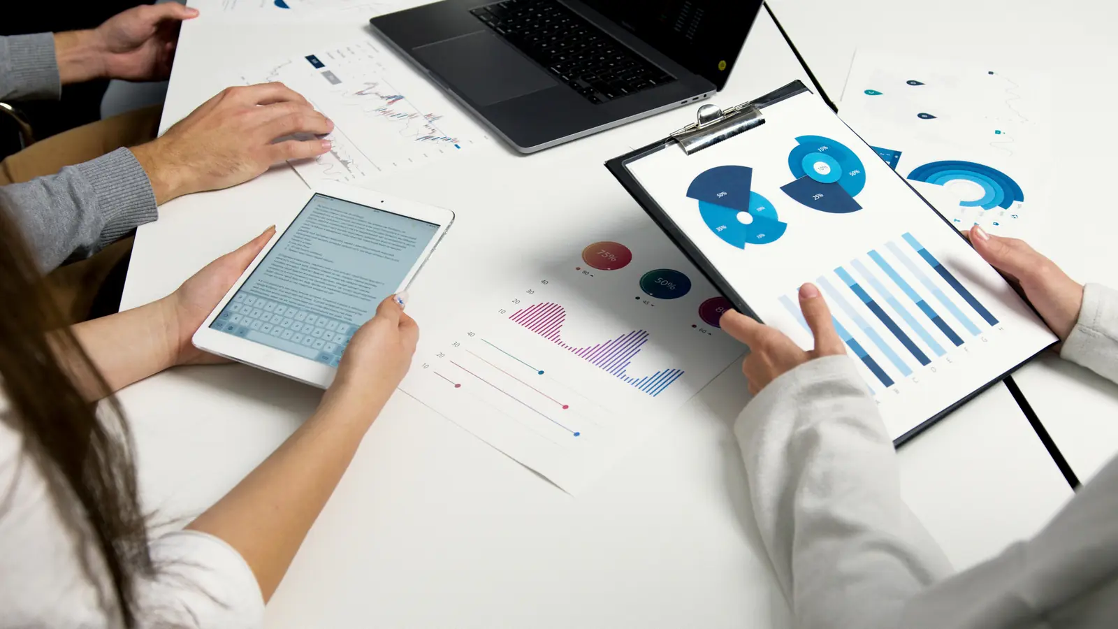 Finance team reviewing charts together